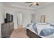 Spacious bedroom featuring neutral paint, carpet, and large windows at 74 Hidden Grove Ct, Garner, NC 27529