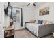 Cozy bedroom featuring a daybed, plush carpet and a mounted television at 74 Hidden Grove Ct, Garner, NC 27529