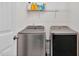Laundry room equipped with a modern washer and dryer at 74 Hidden Grove Ct, Garner, NC 27529