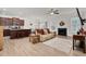 Cozy living room featuring an open floorplan, fireplace, and lots of natural light at 74 Hidden Grove Ct, Garner, NC 27529