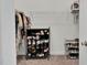 Walk-in closet featuring built in shelves and hanging racks at 74 Hidden Grove Ct, Garner, NC 27529