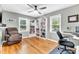Bedroom with hardwood floors, a ceiling fan, and a chair at 774 Salem Church Rd, Sanford, NC 27330