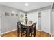 Comfortable dining area with hardwood floors and a dark wood table set at 774 Salem Church Rd, Sanford, NC 27330