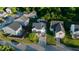 An aerial view of a two-story home situated on a green lawn in a suburban neighborhood at 1022 Early Rise St St, Raleigh, NC 27610