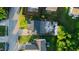 An aerial view of a single-Gathering home with a backyard and an attached garage at 1022 Early Rise St St, Raleigh, NC 27610