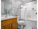 Bathroom with a single sink vanity, toilet, tub and shower combination at 1022 Early Rise St St, Raleigh, NC 27610