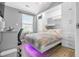 Unique bedroom with a built-in murphy bed and storage cabinets at 1022 Early Rise St St, Raleigh, NC 27610