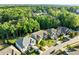 Beautiful neighborhood featuring well-maintained homes, mature trees, and a serene, wooded backdrop at 109 Highland Mist Cir, Apex, NC 27539