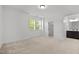 Bright bedroom with carpet flooring, and bathroom and closet access at 109 Highland Mist Cir, Apex, NC 27539