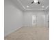 Spacious bedroom boasts neutral carpet, recessed lighting, ceiling fan, and three doors at 109 Highland Mist Cir, Apex, NC 27539