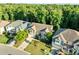 Lovely two-story home featuring a well-maintained lawn, lush landscaping, and a neutral color palette at 109 Highland Mist Cir, Apex, NC 27539