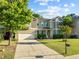 Charming two-story home with an attached two-car garage at 109 Highland Mist Cir, Apex, NC 27539