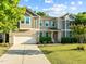 Charming two-story home featuring a well-manicured lawn, attached two-car garage, and traditional architectural details at 109 Highland Mist Cir, Apex, NC 27539