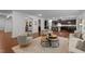 Spacious living room blending seamlessly with the modern kitchen, perfect for entertaining and Gathering gatherings at 109 Highland Mist Cir, Apex, NC 27539
