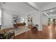 Stylish home office with wood floors, ample natural light, and modern decor at 109 Highland Mist Cir, Apex, NC 27539