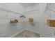 This walk-in closet features ample metal shelving and bars for optimal storage at 109 Highland Mist Cir, Apex, NC 27539