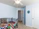 Bedroom featuring carpeted floors and natural light at 112 Victorian Oaks Dr, Durham, NC 27713