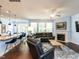 Spacious living room featuring a fireplace, comfortable seating, and natural light at 112 Victorian Oaks Dr, Durham, NC 27713