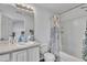 Clean bathroom with a vanity, toilet, shower-tub combination, and neutral finishes at 114 Montview Way, Knightdale, NC 27545