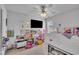 bedroom features a bed with under-bed storage and a variety of play and learning items at 114 Montview Way, Knightdale, NC 27545