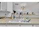 A stainless steel sink is featured below an open wall with laminate countertops at 114 Montview Way, Knightdale, NC 27545