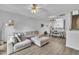 Cozy living room with comfy seating, modern lighting, and an open floor plan at 114 Montview Way, Knightdale, NC 27545