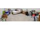 Spacious basement with carpet, boxes and weights offering potential for customization and extra living space at 1199 Cesar Ct, Graham, NC 27253