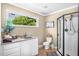 Bright bathroom with a modern glass shower and stylish vanity at 1199 Cesar Ct, Graham, NC 27253