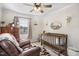 Inviting Bedroom with a classic crib, cozy recliner, soft lighting, and tasteful decor creating a warm atmosphere at 1199 Cesar Ct, Graham, NC 27253