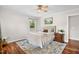 Comfortable bedroom featuring a cozy bed, plush rug, natural light, and warm tones for a peaceful retreat at 1199 Cesar Ct, Graham, NC 27253