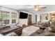 Spacious living room with natural light, comfortable seating, and wood flooring at 1199 Cesar Ct, Graham, NC 27253