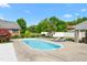 Refreshing backyard pool area with lounge chairs and ample space for relaxation and entertainment at 1199 Cesar Ct, Graham, NC 27253