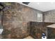 Updated walk-in shower featuring dual shower heads and beautiful tiled surround with natural light at 1199 Cesar Ct, Graham, NC 27253