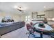 Finished basement area with a poker table, lounge, and wet bar at 1209 Briar Patch Ln, Raleigh, NC 27615