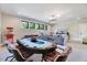 Basement with a poker table, seating, and entertainment area at 1209 Briar Patch Ln, Raleigh, NC 27615
