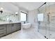 Beautiful bathroom featuring a glass-enclosed shower, soaking tub, and modern fixtures at 1209 Briar Patch Ln, Raleigh, NC 27615