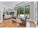 Cozy dining room featuring a large window overlooking the outdoor landscape at 1209 Briar Patch Ln, Raleigh, NC 27615