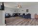 Inviting living room with lots of comfortable seating and nice flooring at 126 Thimbleweed Ln, Lillington, NC 27546