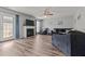 Spacious living room features a cozy fireplace and modern gray walls at 126 Thimbleweed Ln, Lillington, NC 27546