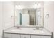 Modern bathroom vanity with double sinks, granite countertops and a large mirror over the countertop at 15 Nottingham Pl, Smithfield, NC 27577