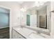 Spacious bathroom vanity with double sinks, granite countertops and a large mirror over the countertop at 15 Nottingham Pl, Smithfield, NC 27577