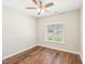 Bright bedroom with hardwood floors, a ceiling fan, and natural light from the window at 15 Nottingham Pl, Smithfield, NC 27577