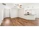 Open living space with hardwood floors and a kitchen view at 15 Nottingham Pl, Smithfield, NC 27577