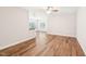 Open-concept living room with hardwood floors and a view of the kitchen at 15 Nottingham Pl, Smithfield, NC 27577