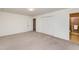 Bedroom boasts neutral carpet, a closet, and an en-suite bathroom with a shower at 1604 Westbridge Ct, Raleigh, NC 27606