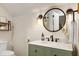 Bright and cheerful bathroom featuring a decorative vanity, lighting, and modern fixtures at 168 E Deer, Apex, NC 27523