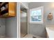 Bathroom featuring a glass shower and window, offering functionality and natural light at 168 E Deer, Apex, NC 27523