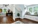Inviting bedroom with natural light, a built-in window seat, and wood floors at 168 E Deer, Apex, NC 27523