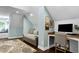 Cozy bedroom featuring a study area, daybed, natural light, and hardwood floors at 168 E Deer, Apex, NC 27523