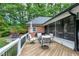 Inviting outdoor deck with comfortable seating, perfect for relaxing or entertaining guests at 168 E Deer, Apex, NC 27523